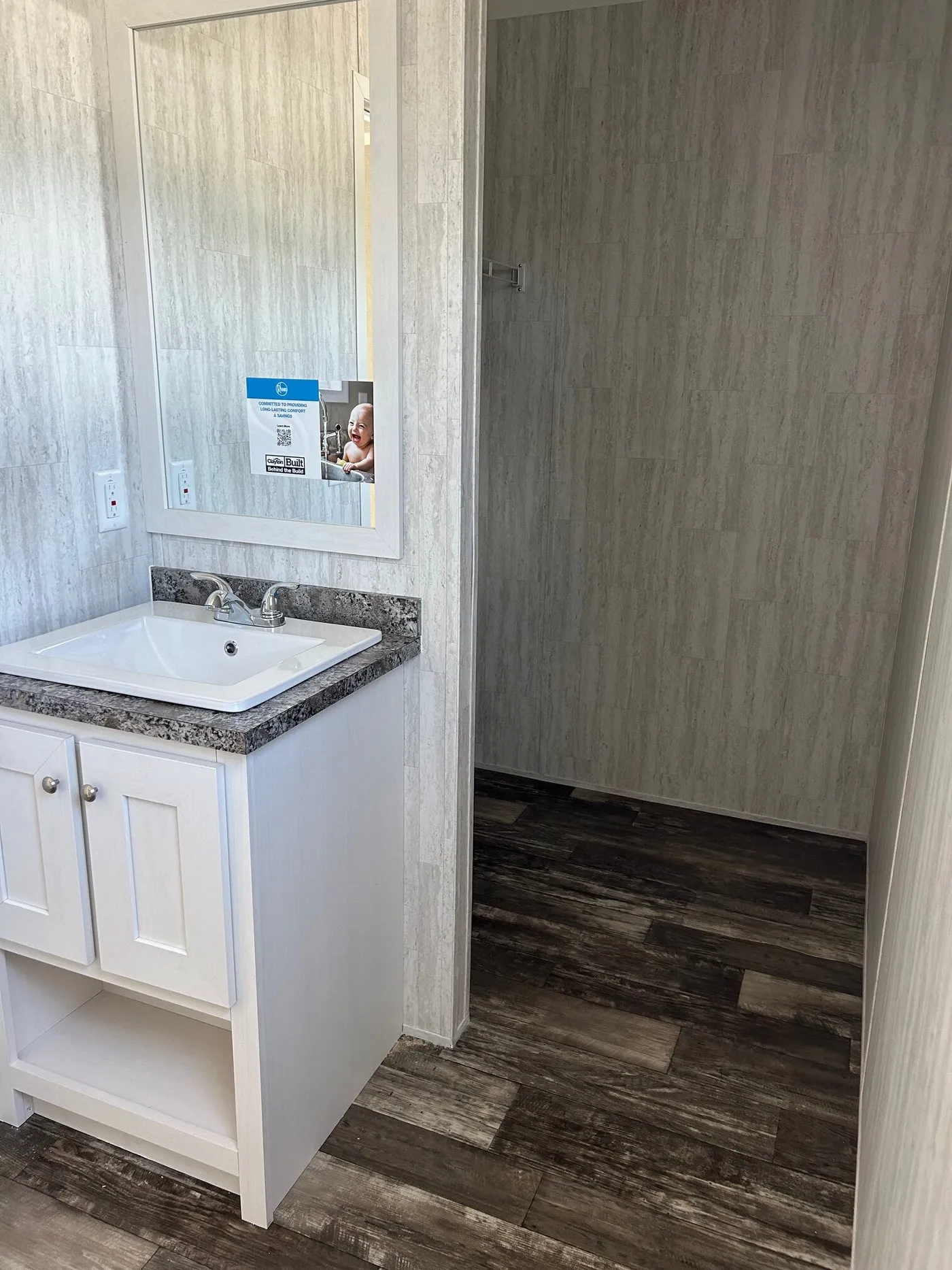 The SAPPHIRE XL 8016-644 Guest Bathroom. This Manufactured Mobile Home features 3 bedrooms and 2 baths.