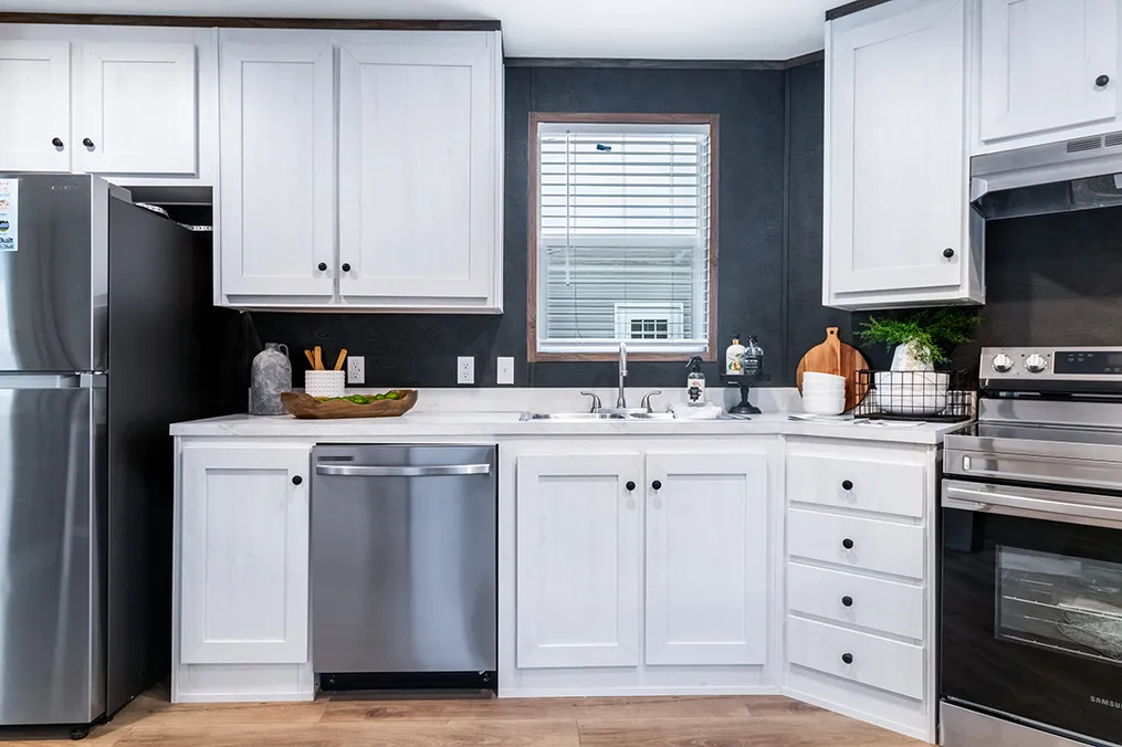 The SELECT 16723F Kitchen. This Manufactured Mobile Home features 3 bedrooms and 2 baths.