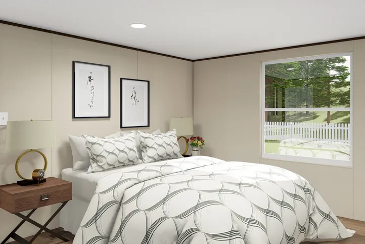 The GLORY Primary Bedroom. This Manufactured Mobile Home features 3 bedrooms and 2 baths.