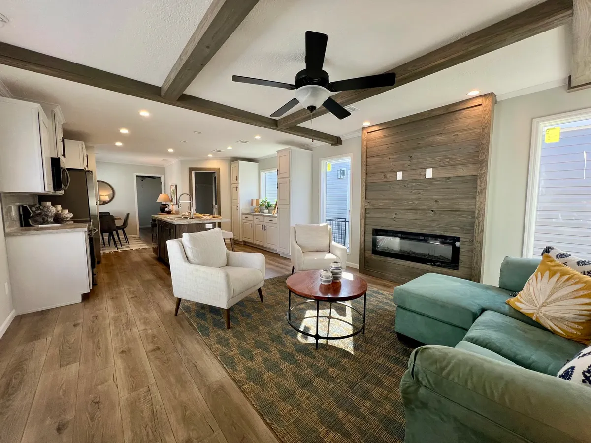 The THE TRUMAN Living Room. This Manufactured Mobile Home features 3 bedrooms and 2 baths.