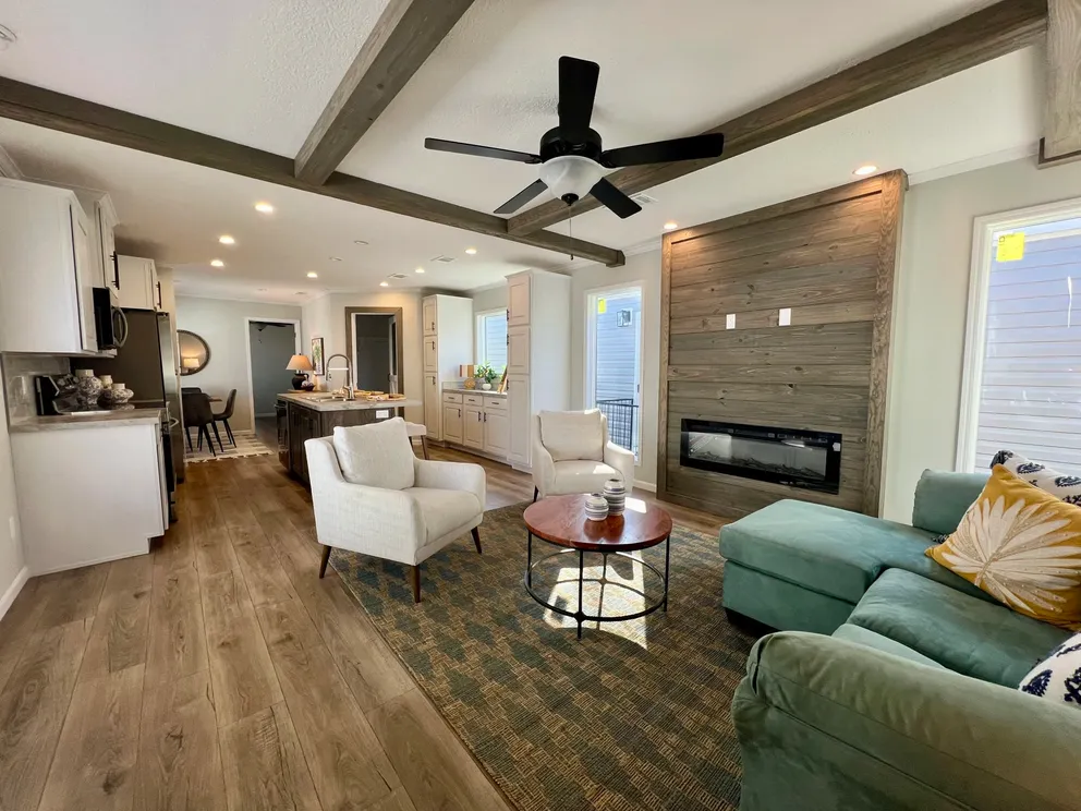 The THE TRUMAN Living Room. This Manufactured Mobile Home features 3 bedrooms and 2 baths.