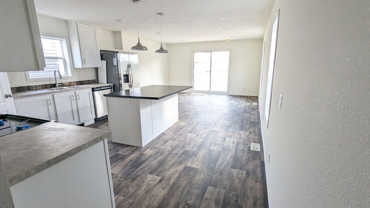 The LIFESTYLE 217 Kitchen. This Manufactured Mobile Home features 3 bedrooms and 2 baths.