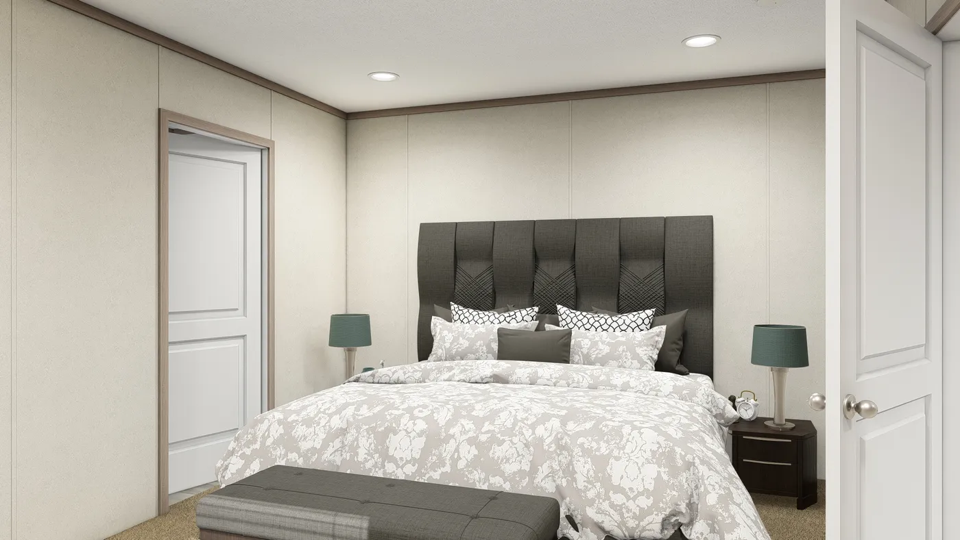 The 7616-4714 THE PULSE Primary Bedroom. This Manufactured Mobile Home features 3 bedrooms and 2 baths.
