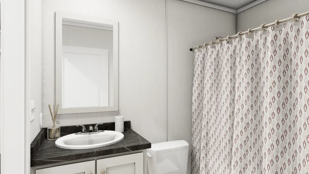 The TURQUOISE Guest Bathroom. This Manufactured Mobile Home features 2 bedrooms and 2 baths.