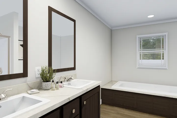 The SANTA FE 684A Primary Bathroom. This Manufactured Mobile Home features 4 bedrooms and 2 baths.