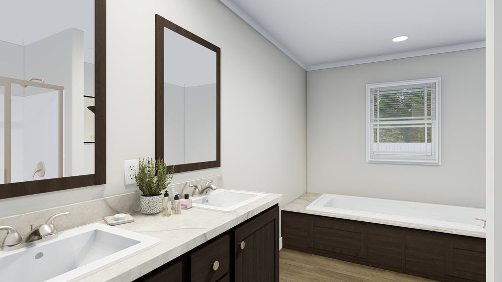 The SANTA FE 684A Primary Bathroom. This Manufactured Mobile Home features 4 bedrooms and 2 baths.