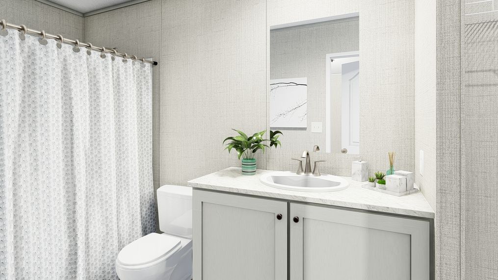 The COASTAL BREEZE I  16X72 Primary Bathroom. This Manufactured Mobile Home features 3 bedrooms and 2 baths.