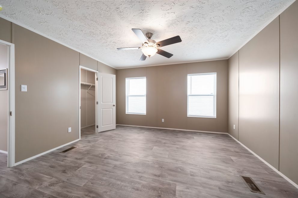 The ISLAND BREEZE Bedroom. This Manufactured Mobile Home features 3 bedrooms and 2 baths.