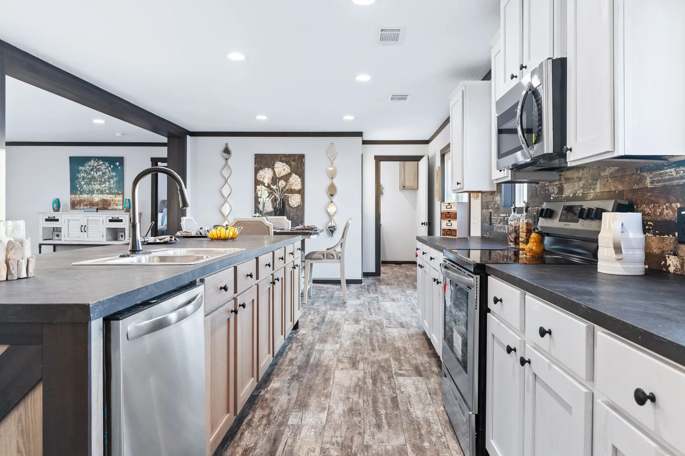The BOUJEE XL Kitchen. This Manufactured Mobile Home features 4 bedrooms and 3 baths.