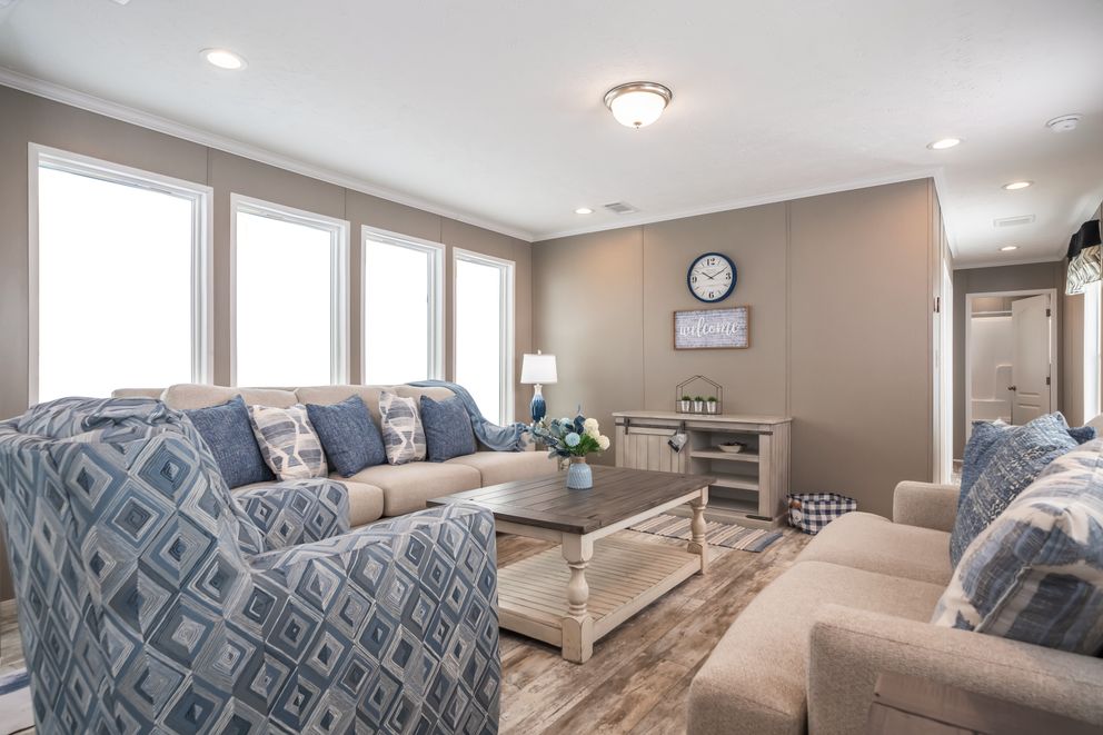 The MAJOR Living Room. This Manufactured Mobile Home features 3 bedrooms and 2 baths.