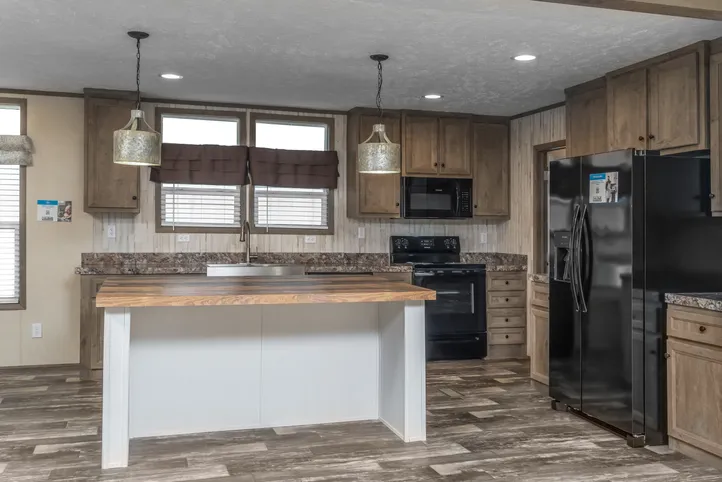 The NUMBER ONE Exterior. This Manufactured Mobile Home features 3 bedrooms and 2 baths.