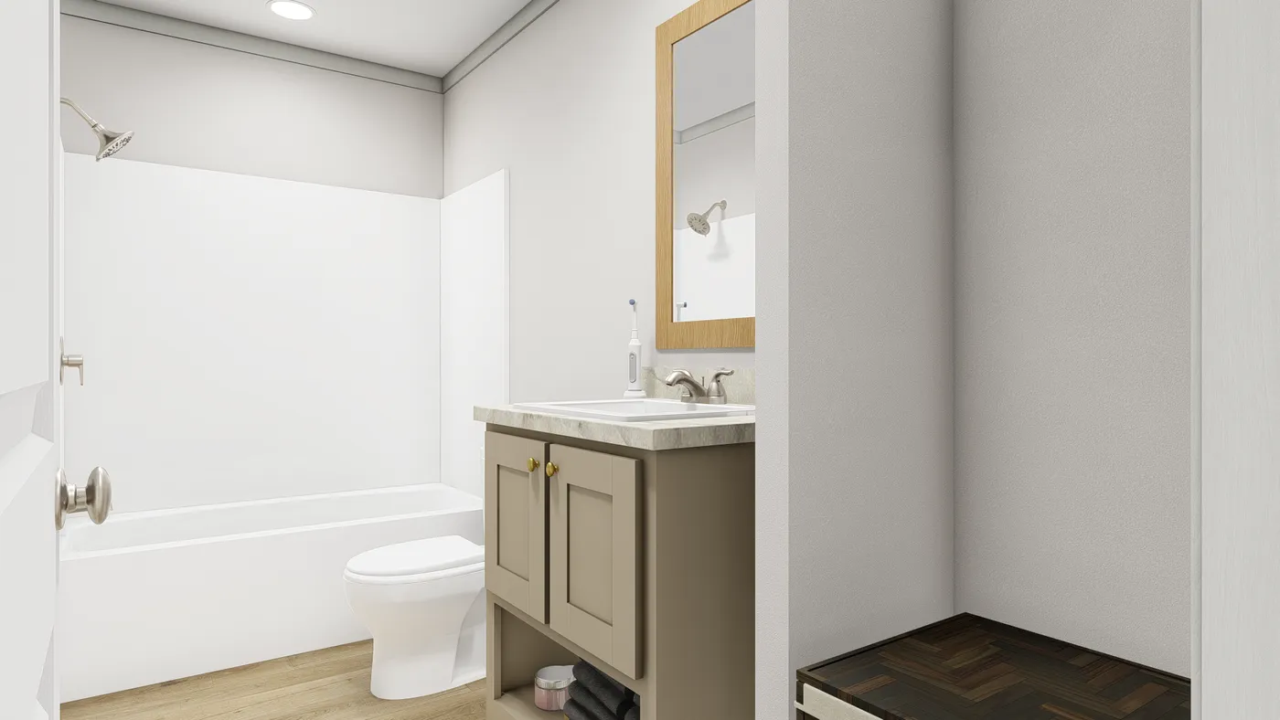 The WHOLE LOTTA LOVE Guest Bathroom. This Manufactured Mobile Home features 3 bedrooms and 2 baths.