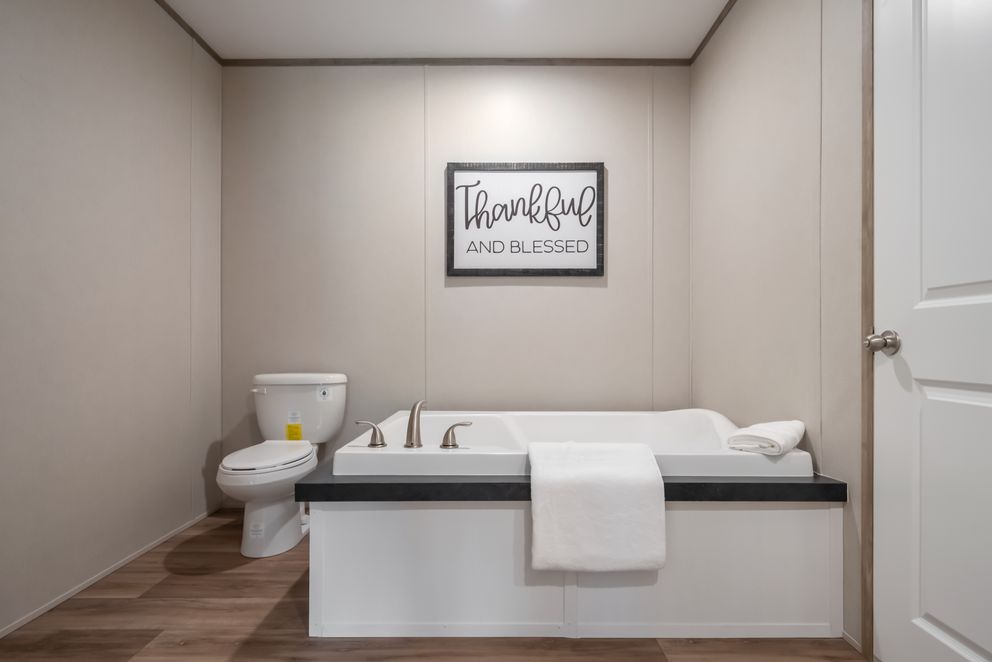 The VISTA Primary Bathroom. This Manufactured Mobile Home features 3 bedrooms and 2 baths.