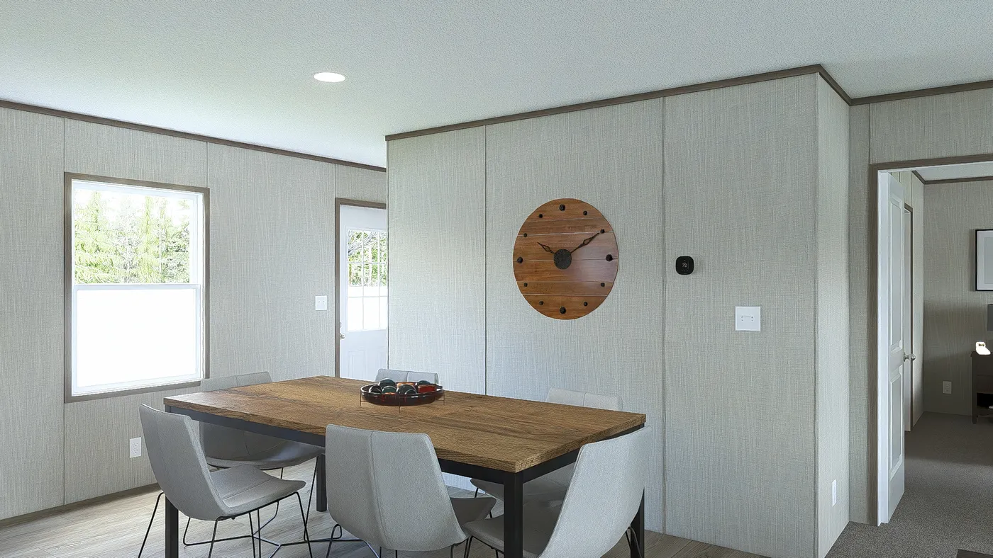 The LEGEND 28X48 Dining Room. This Manufactured Mobile Home features 3 bedrooms and 2 baths.