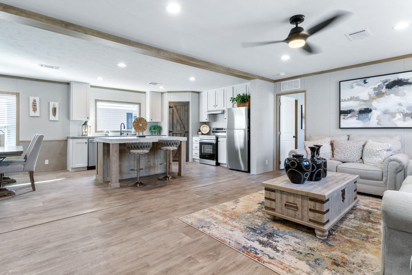 The PT 78 Living Room. This Manufactured Mobile Home features 3 bedrooms and 2 baths.
