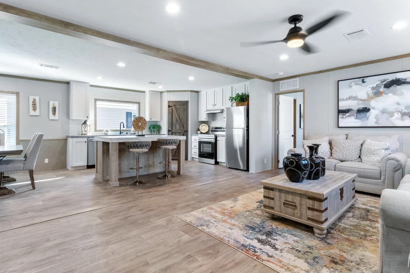 The PT 78 Living Room. This Manufactured Mobile Home features 3 bedrooms and 2 baths.