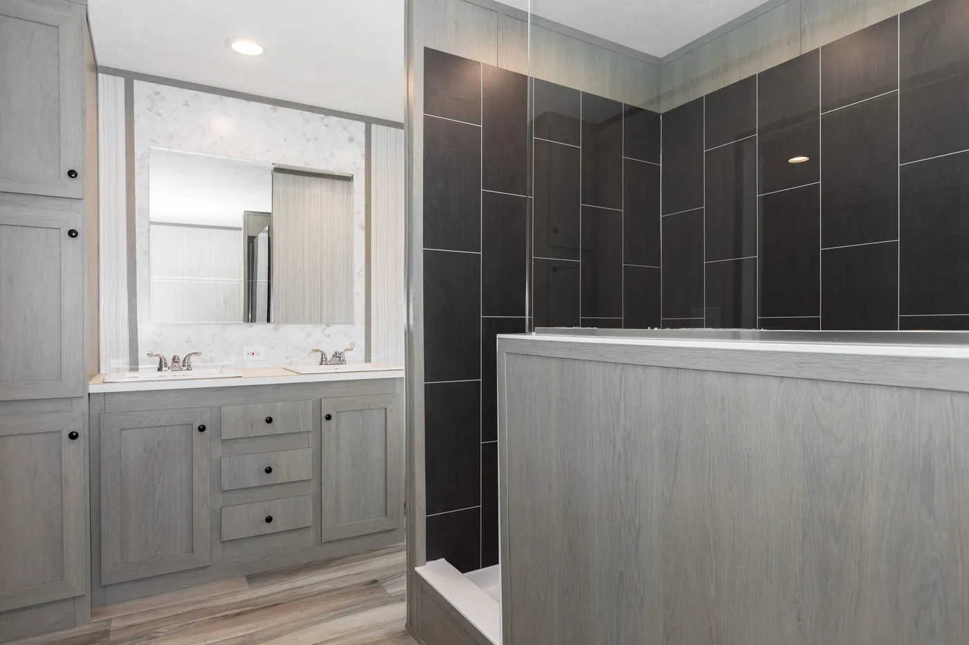 The THE ULTIMATE SHOWER Primary Bathroom. This Manufactured Mobile Home features 3 bedrooms and 2 baths.