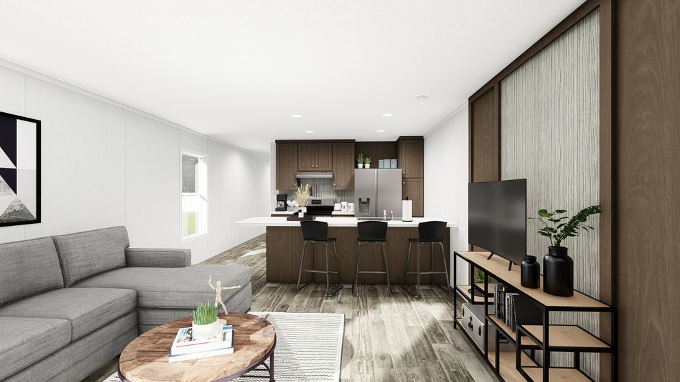The PERIDOT Living Room. This Manufactured Mobile Home features 2 bedrooms and 1 bath.