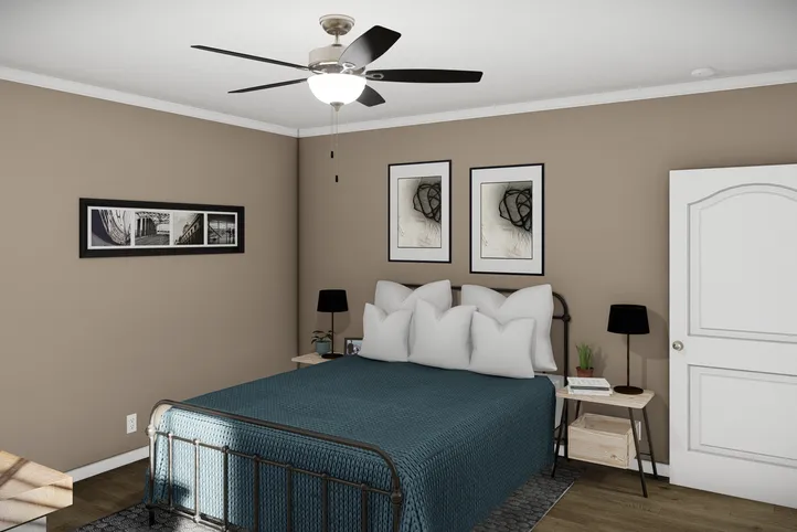 The THE BANDON Primary Bedroom. This Manufactured Mobile Home features 3 bedrooms and 2 baths.