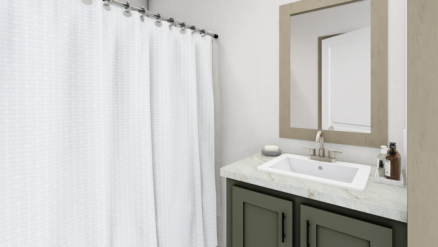The LEWIS Guest Bathroom. This Manufactured Mobile Home features 2 bedrooms and 2 baths.