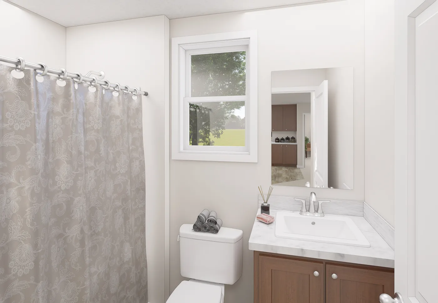 The 5019 IMAGINE Guest Bathroom. This Manufactured Mobile Home features 3 bedrooms and 2 baths.