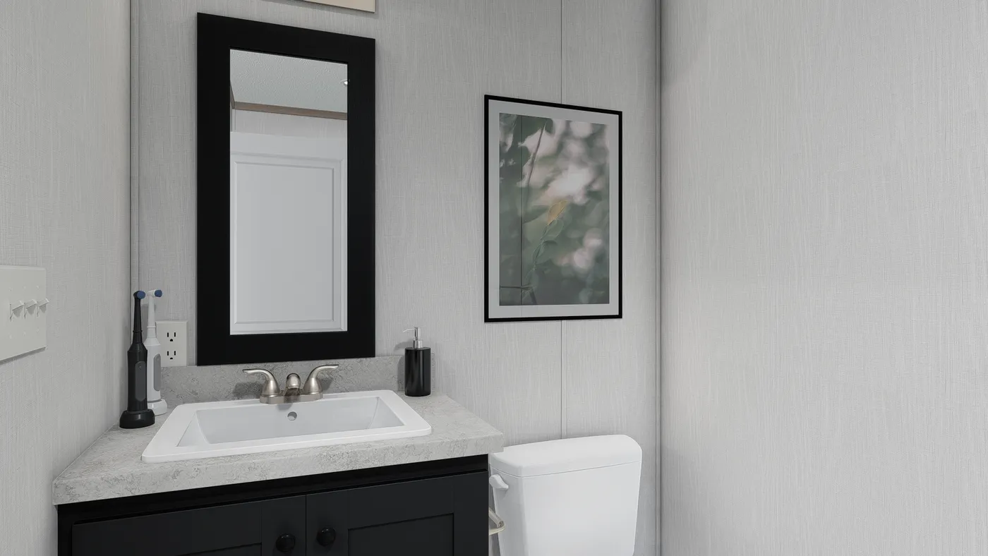 The 6616-4711 THE PULSE Primary Bathroom. This Manufactured Mobile Home features 3 bedrooms and 2 baths.