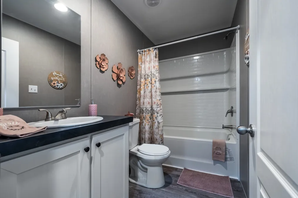The TRADITION 48 Guest Bathroom. This Manufactured Mobile Home features 3 bedrooms and 2 baths.