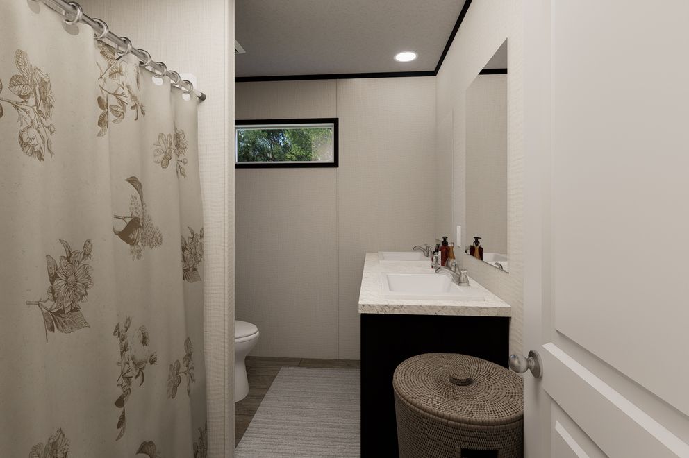 The ULTRA PRO HERCULES 28X68 3BR Guest Bathroom. This Manufactured Mobile Home features 3 bedrooms and 2 baths.