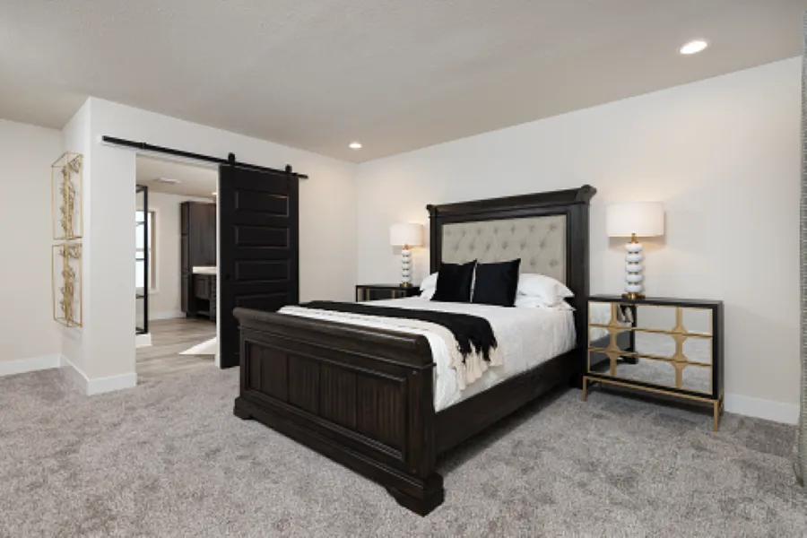 The STRATFORD PL 6630-MS062 SECT Primary Bedroom. This Manufactured Mobile Home features 3 bedrooms and 2 baths.