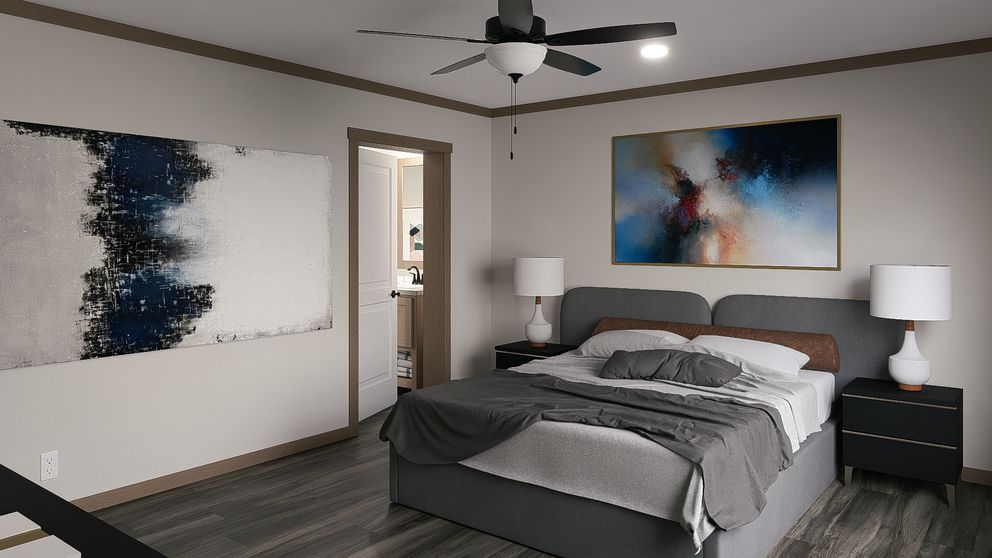 The LIZZIE Primary Bedroom. This Manufactured Mobile Home features 3 bedrooms and 2 baths.