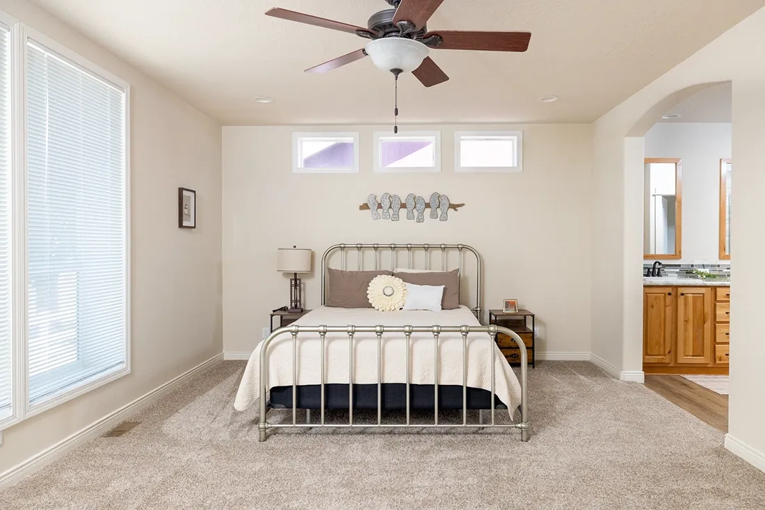 The TH601F                 CLAYTON Primary Bedroom. This Manufactured Mobile Home features 3 bedrooms and 2 baths.