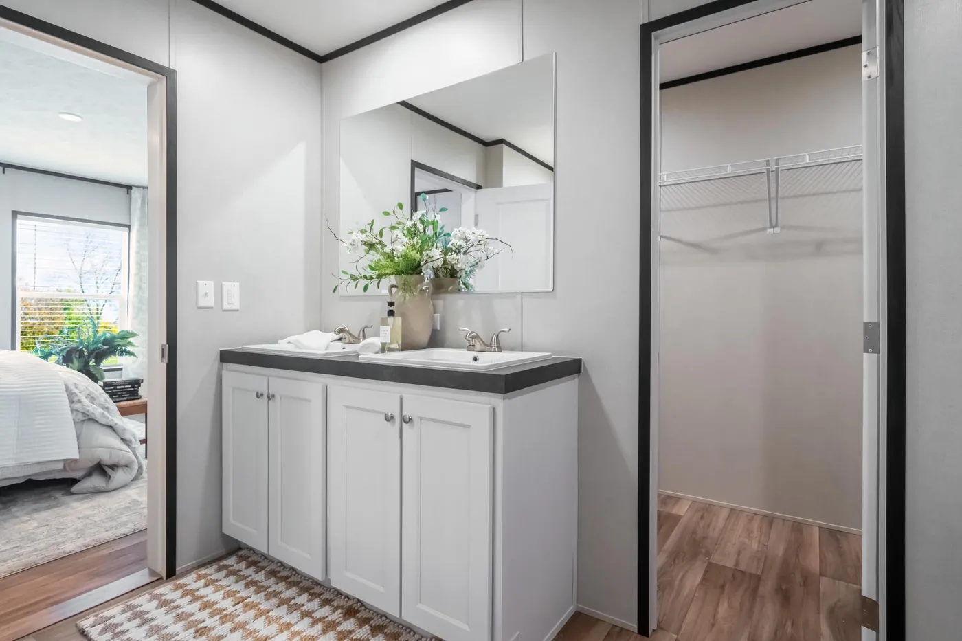 The ELEMENT Primary Bedroom. This Manufactured Mobile Home features 3 bedrooms and 2 baths.