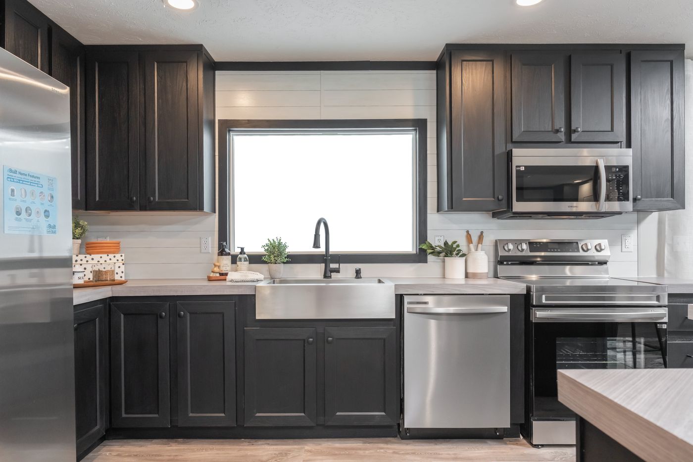 The CRAZY EIGHTS Kitchen. This Manufactured Mobile Home features 4 bedrooms and 2 baths.