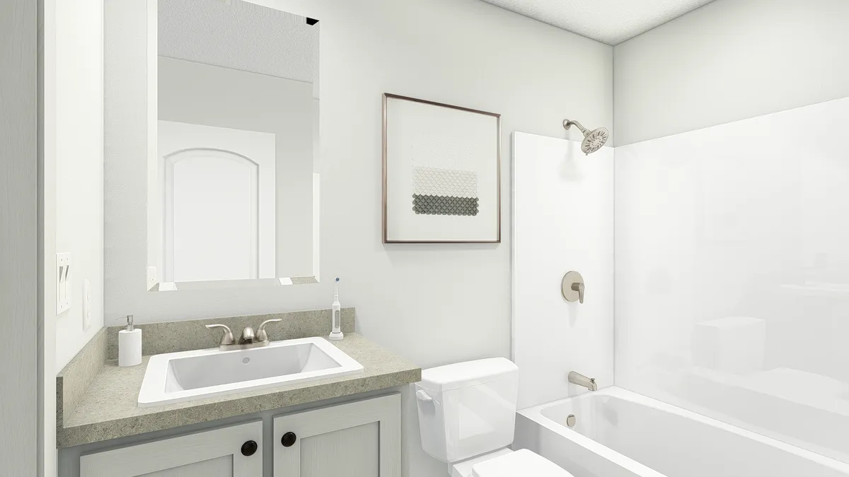 The ABBEY ROAD Guest Bathroom. This Manufactured Mobile Home features 3 bedrooms and 2 baths.