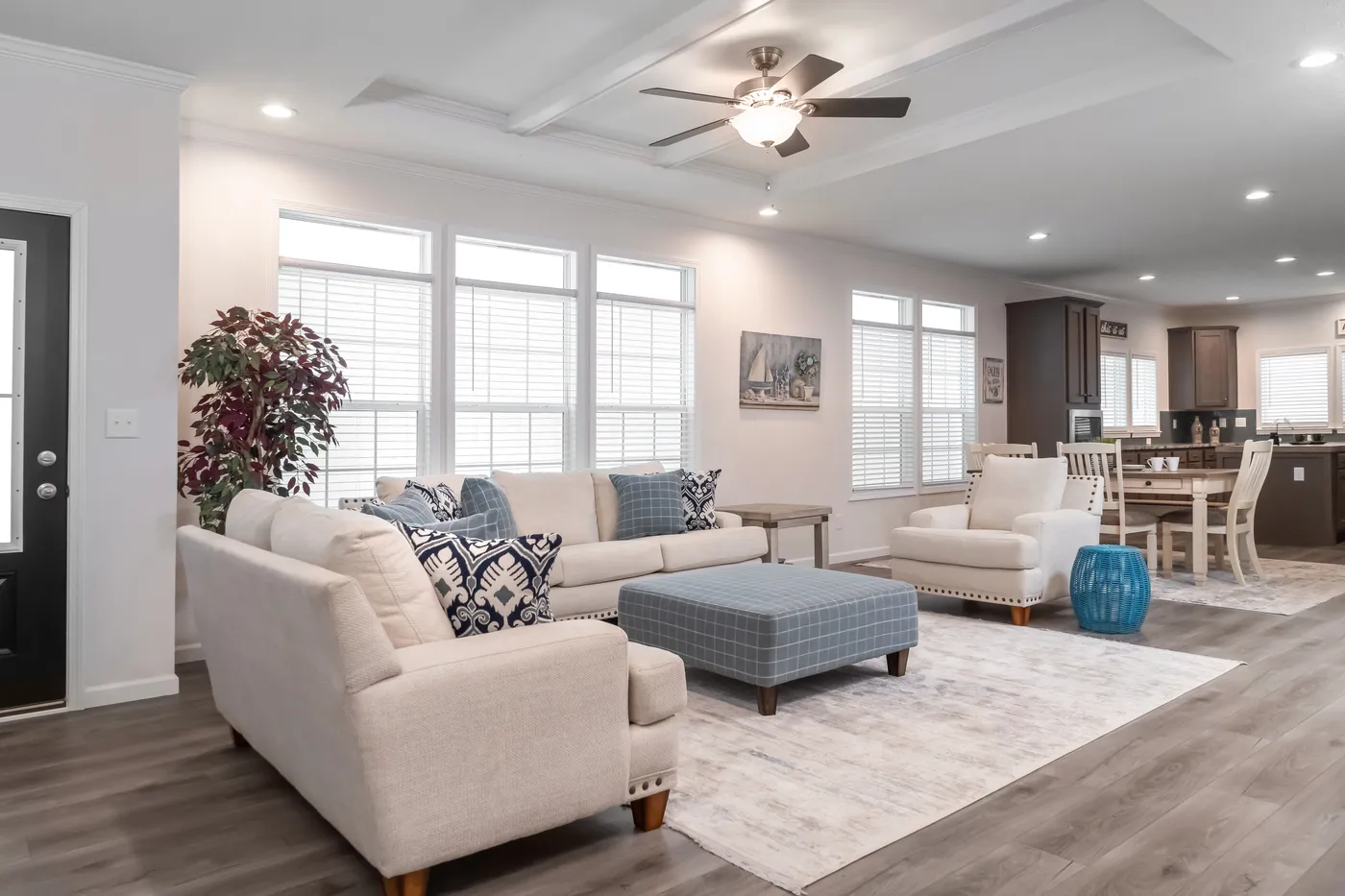 The 3458 MOD 76X32 CAROLINA RAELYN Living Room. This Modular Home features 4 bedrooms and 3 baths.