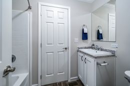 The BROOKLINE FLEX 32 WIDE Guest Bathroom. This Manufactured Mobile Home features 4 bedrooms and 3 baths.