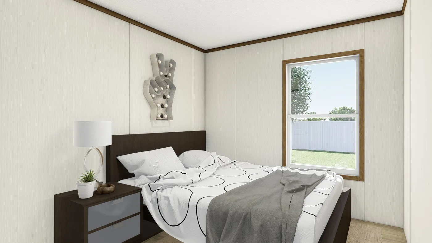 The REVEAL Bedroom. This Manufactured Mobile Home features 3 bedrooms and 2 baths.