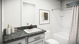 The THE PARKER Guest Bathroom. This Manufactured Mobile Home features 3 bedrooms and 2 baths.