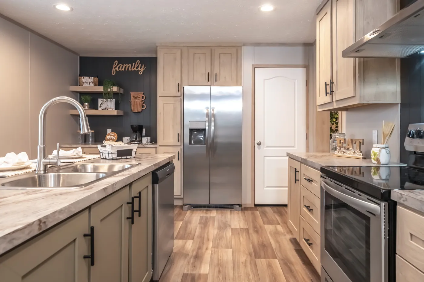 The RAINIER Kitchen. This Manufactured Mobile Home features 4 bedrooms and 3 baths.