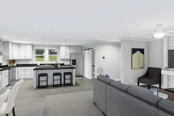 The THE BREEZE Living Room. This Manufactured Mobile Home features 3 bedrooms and 2 baths.
