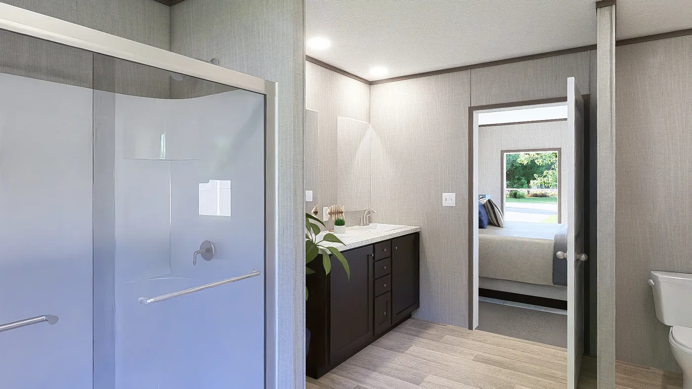 The ULTRA BREEZE 28X76 Primary Bathroom. This Manufactured Mobile Home features 4 bedrooms and 2 baths.