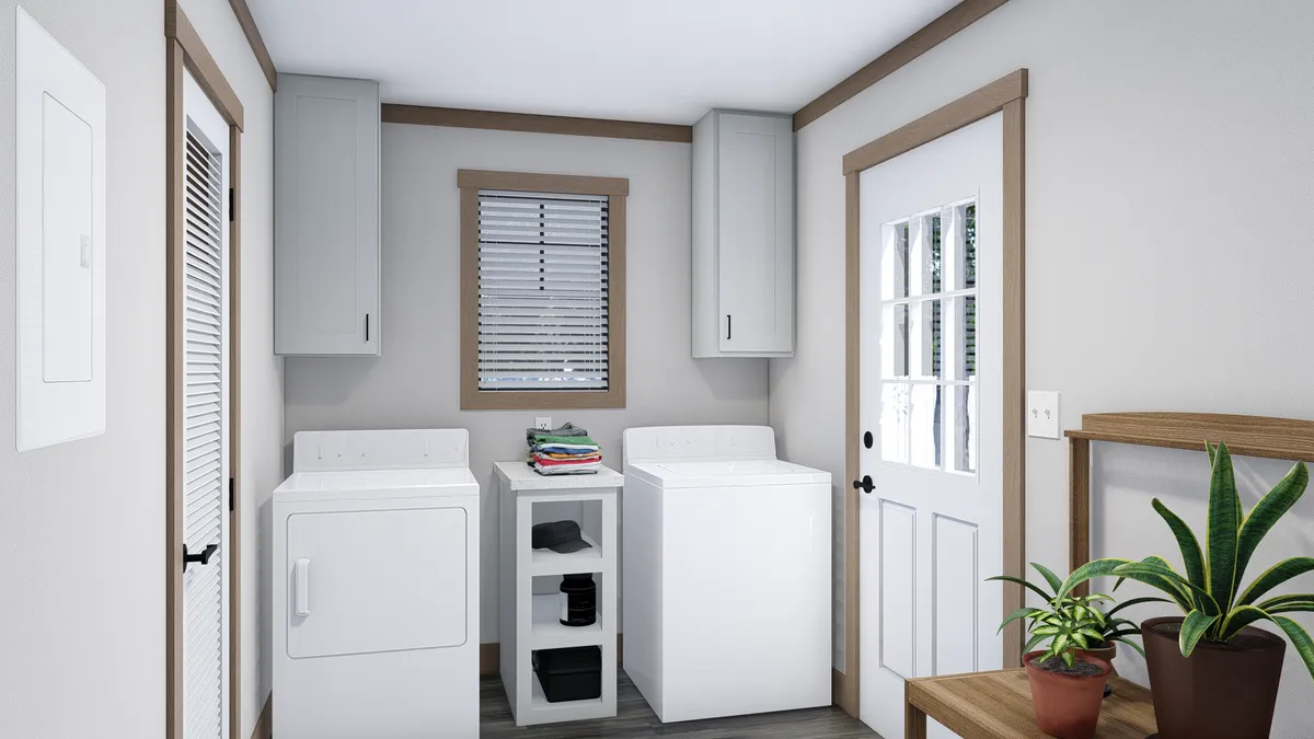 The WILDER Utility Room. This Manufactured Mobile Home features 3 bedrooms and 2 baths.