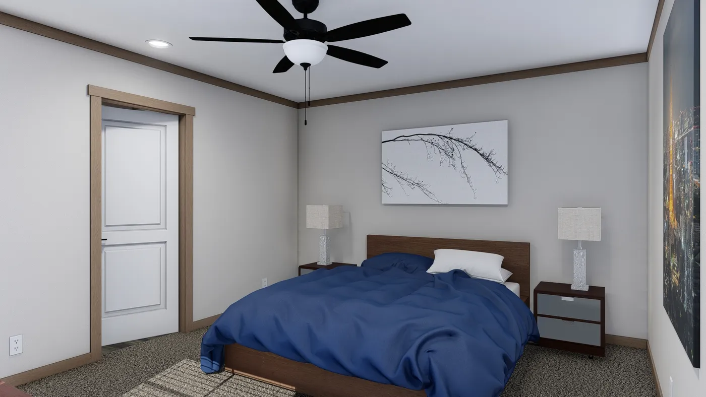 The LIBBY Primary Bedroom. This Manufactured Mobile Home features 3 bedrooms and 2 baths.