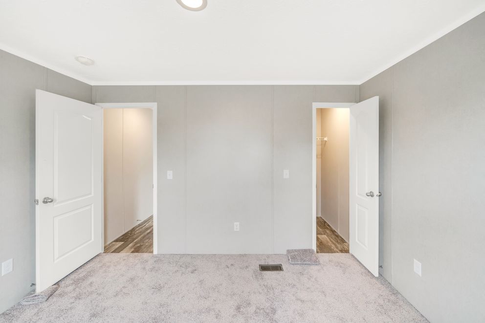 The RUBY Guest Bedroom. This Manufactured Mobile Home features 2 bedrooms and 2 baths.