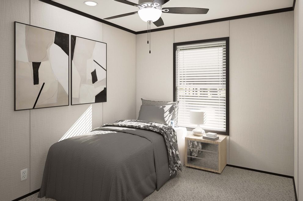 The PLATINUM ANNIVERSARY Bedroom. This Manufactured Mobile Home features 3 bedrooms and 2 baths.