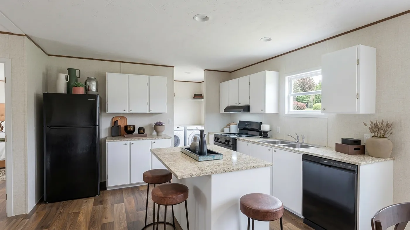 The MAPLE Kitchen. This Manufactured Mobile Home features 3 bedrooms and 2 baths.