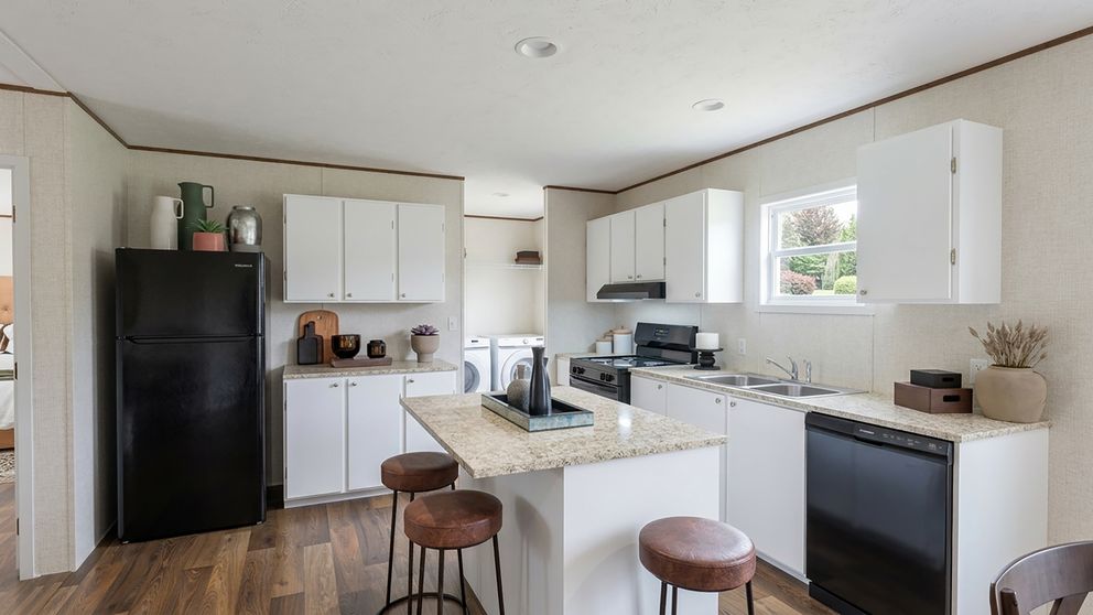 The MAPLE Kitchen. This Manufactured Mobile Home features 3 bedrooms and 2 baths.