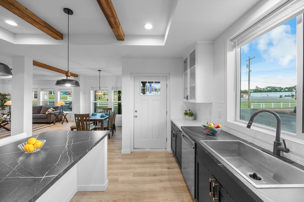 The LULAMAE 3 Kitchen. This Manufactured Mobile Home features 3 bedrooms and 2 baths.