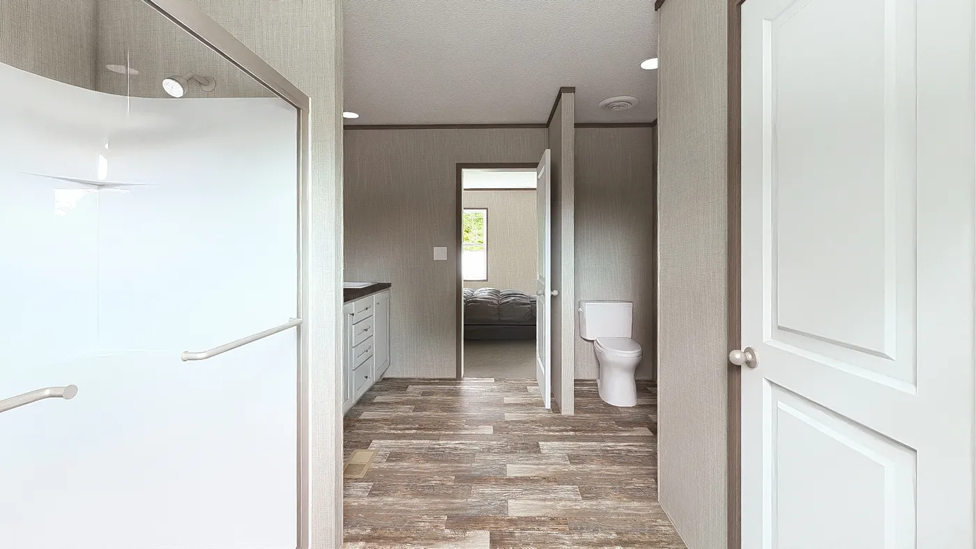 The ULTRA BREEZE 28X52 Primary Bathroom. This Manufactured Mobile Home features 3 bedrooms and 2 baths.