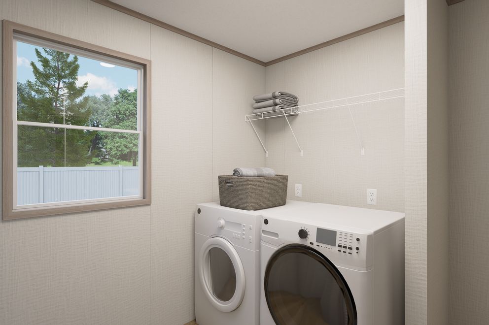 The ULTRA FLEX Utility Room. This Manufactured Mobile Home features 4 bedrooms and 2 baths.